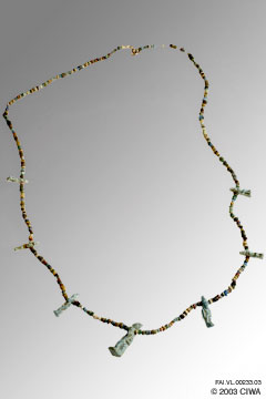 Necklace with beads and seven amulets