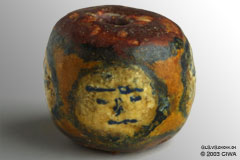 Face bead of undetermined origin